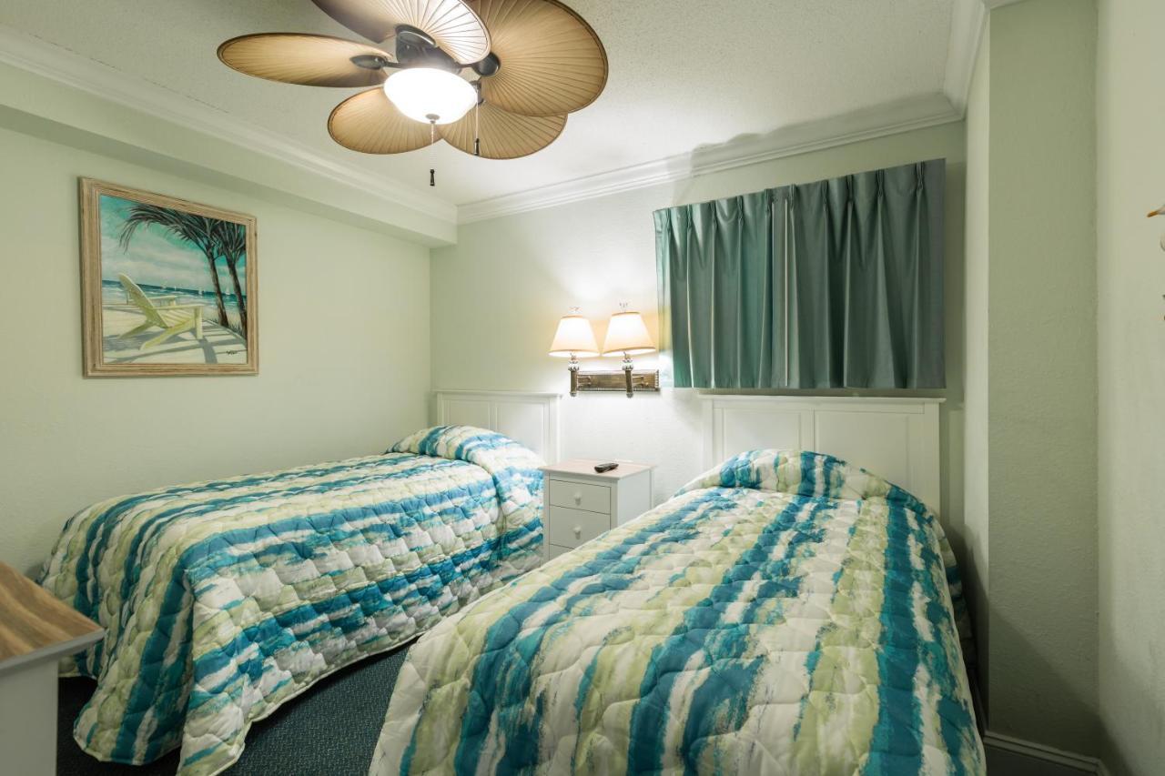 Sands Beach Club Briarcliffe Acres Esterno foto
